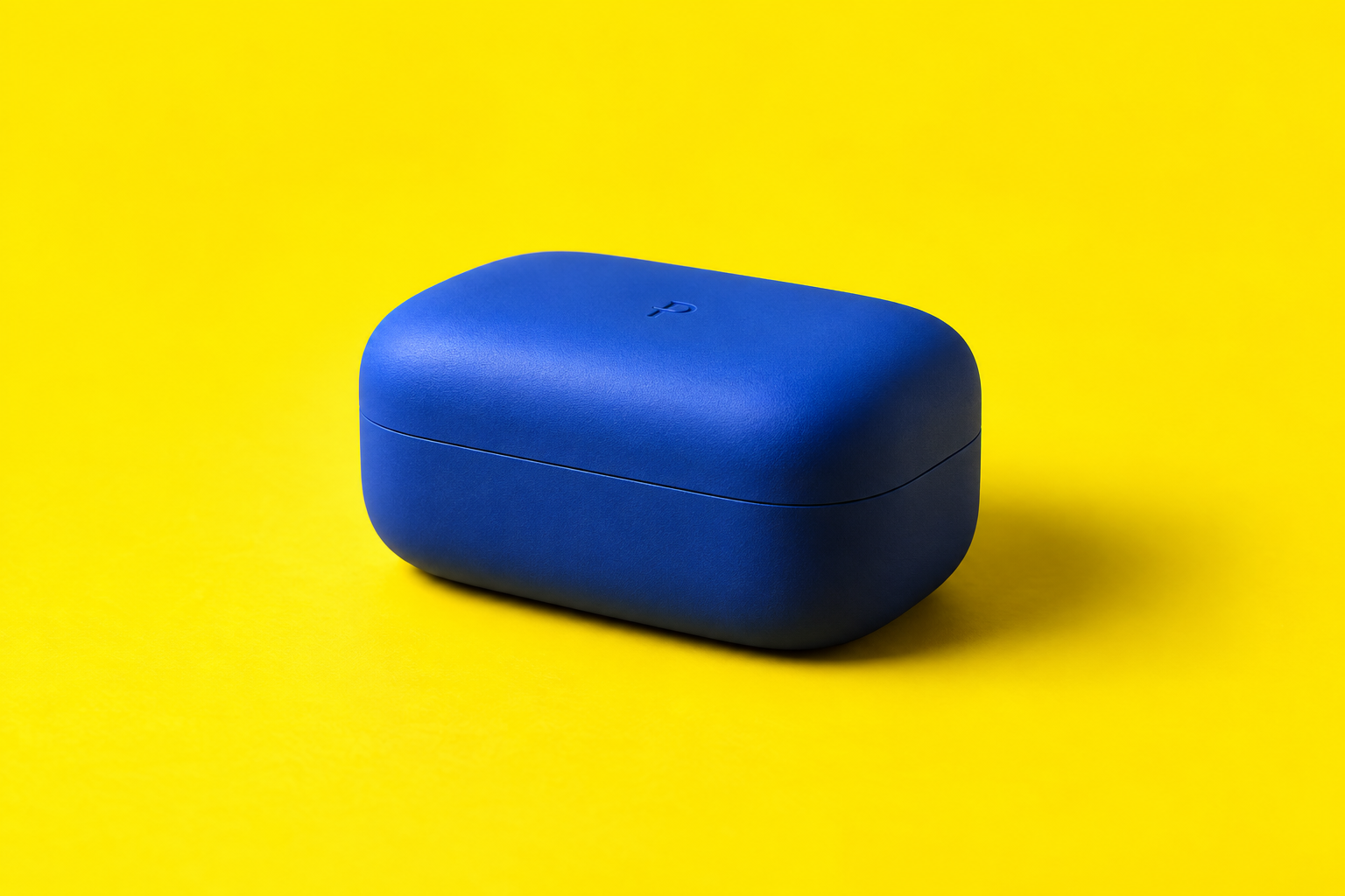 Cobalt blue Product object on a yellow studio backdrop